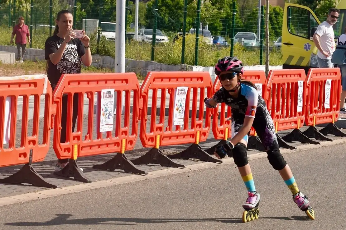 II Carrera Solidaria ‘Patinando por Angola’ organizada por el Centro Juvenil Don Bosco en el barrio de La Lastra de León