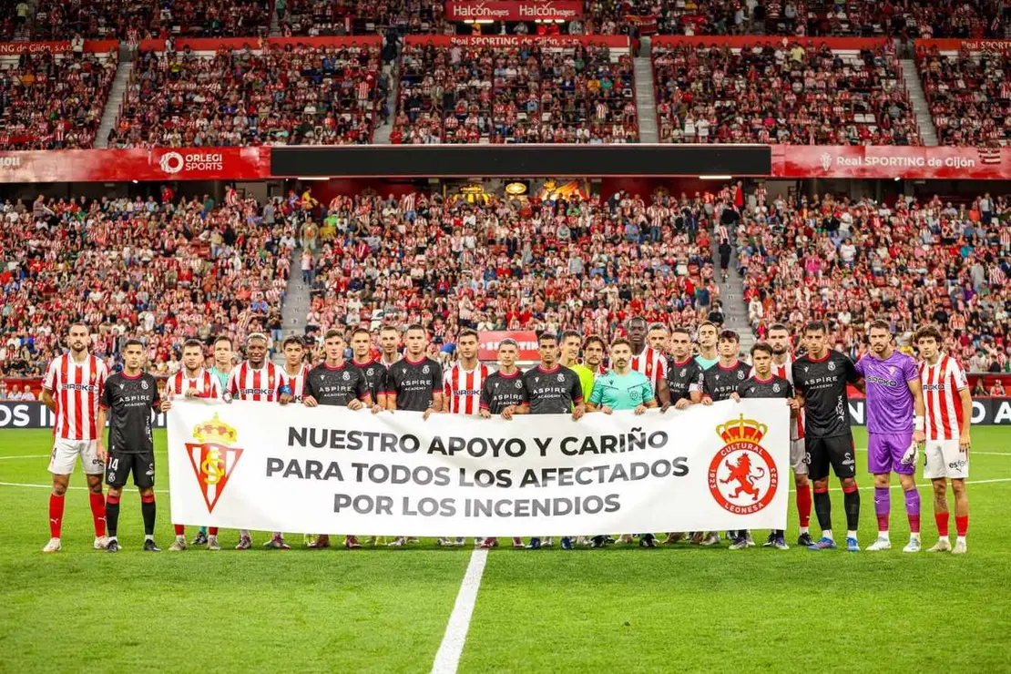Pancarta inicial... solidaridad con los afectados por los incendios.