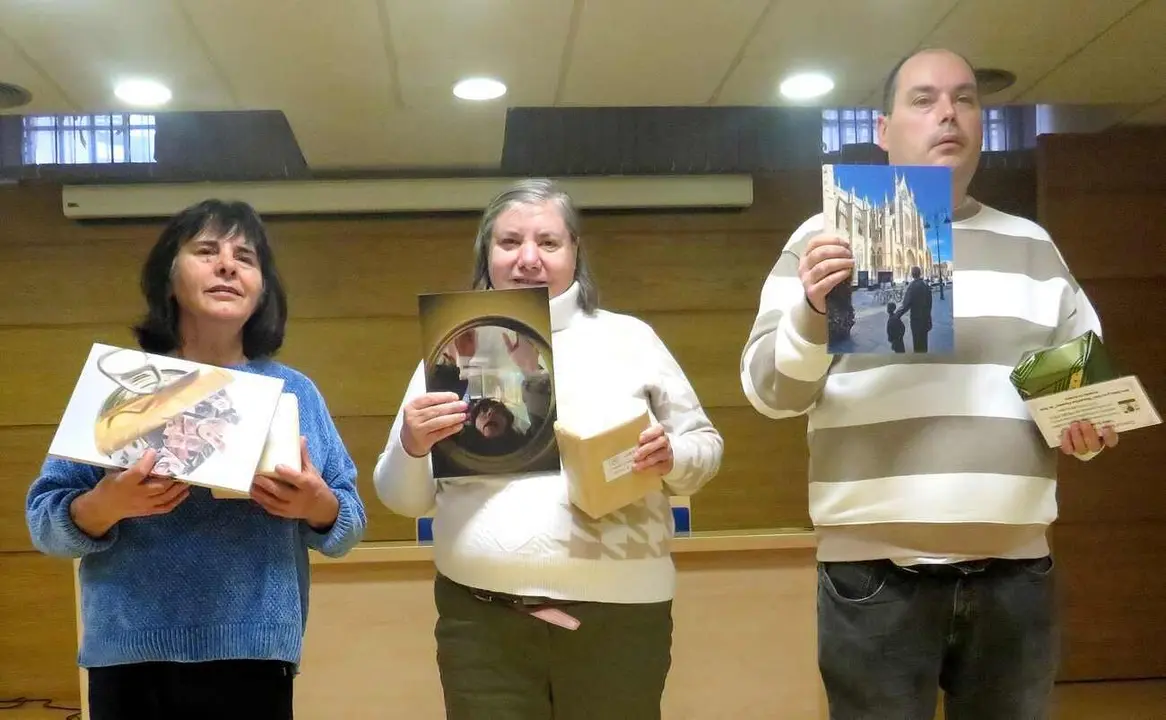 Imagen de los premiados, con sus fotografías y distinciones.