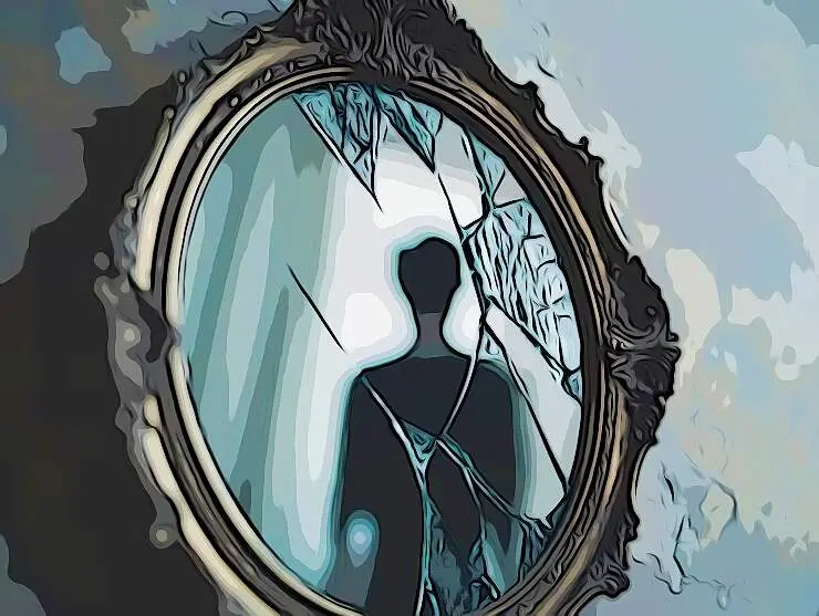 espejo-roto-que-refleja-expresion-triste-persona-pie-frente-el-que-simboliza-fragmentacion-emocional_1214173-61191_AnyMaking (1)