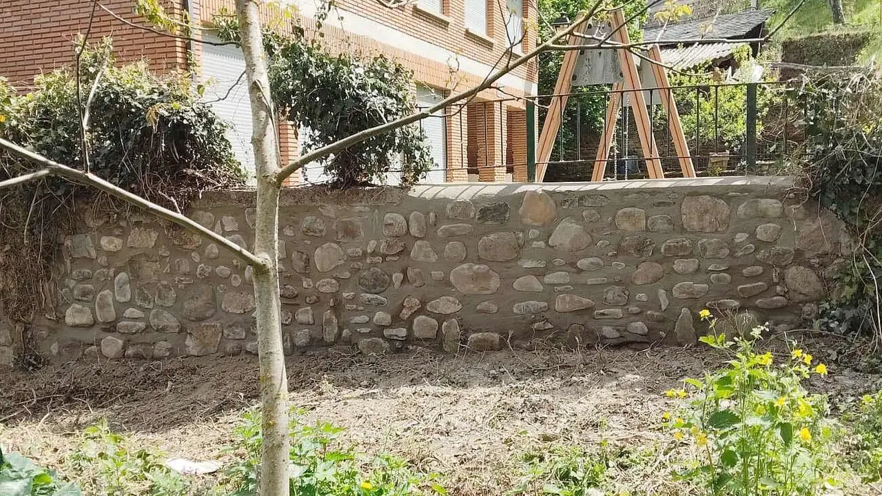 Imagen de un muro reparado durante las intervenciones.