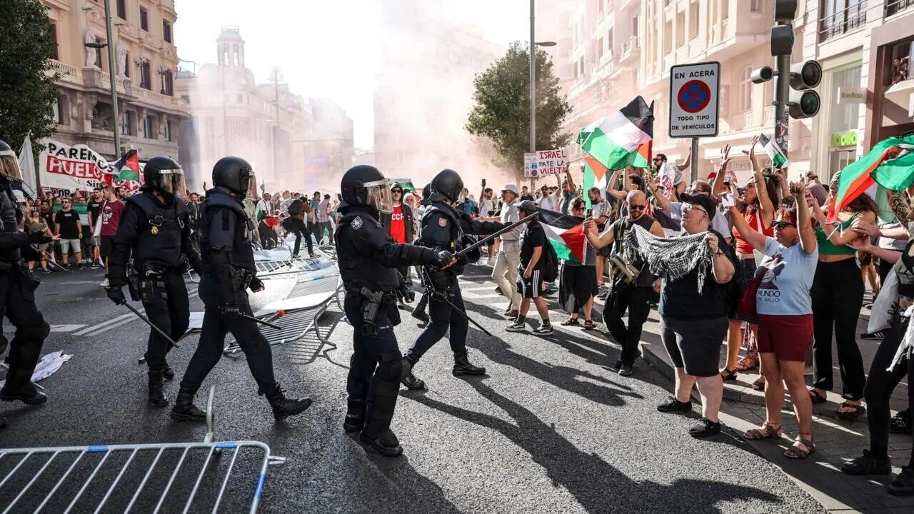 V a España