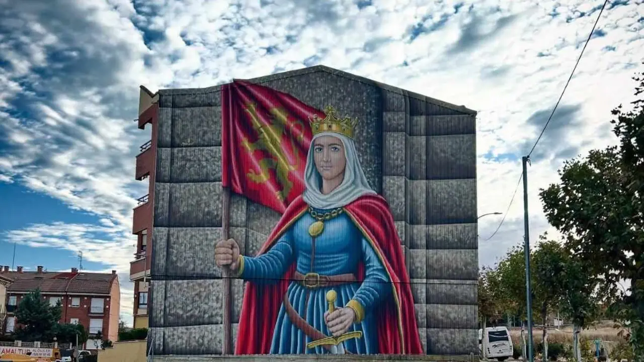 Sahagún rinde homenaje a la reina Urraca con un mural monumental como antesala del 900 aniversario de su muerte. El artista leonés Manuel García Juan firma una obra de gran formato que representa a la primera reina de pleno derecho de España y Europa.
