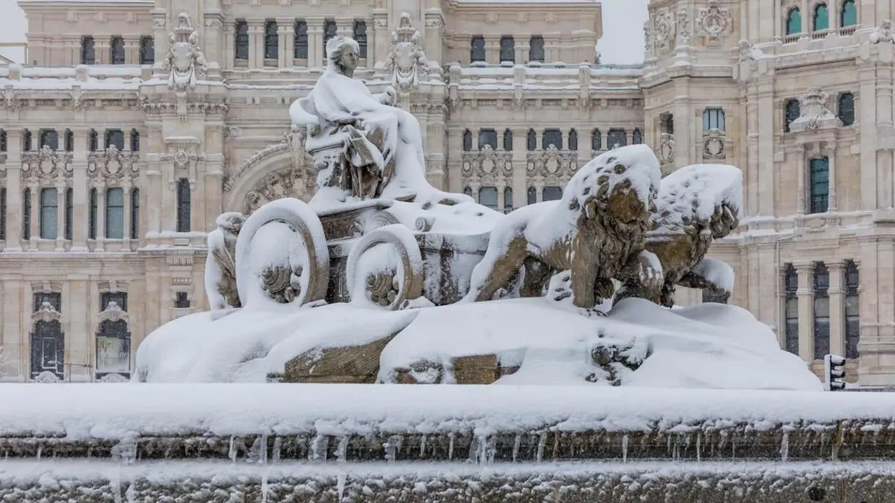 MADRID, SPAIN - JANUARY 09, 2021 - people enjoying the streets of snow, in the city of Madrid, covered by the storm philomena, january 05, 2021 in Madrid