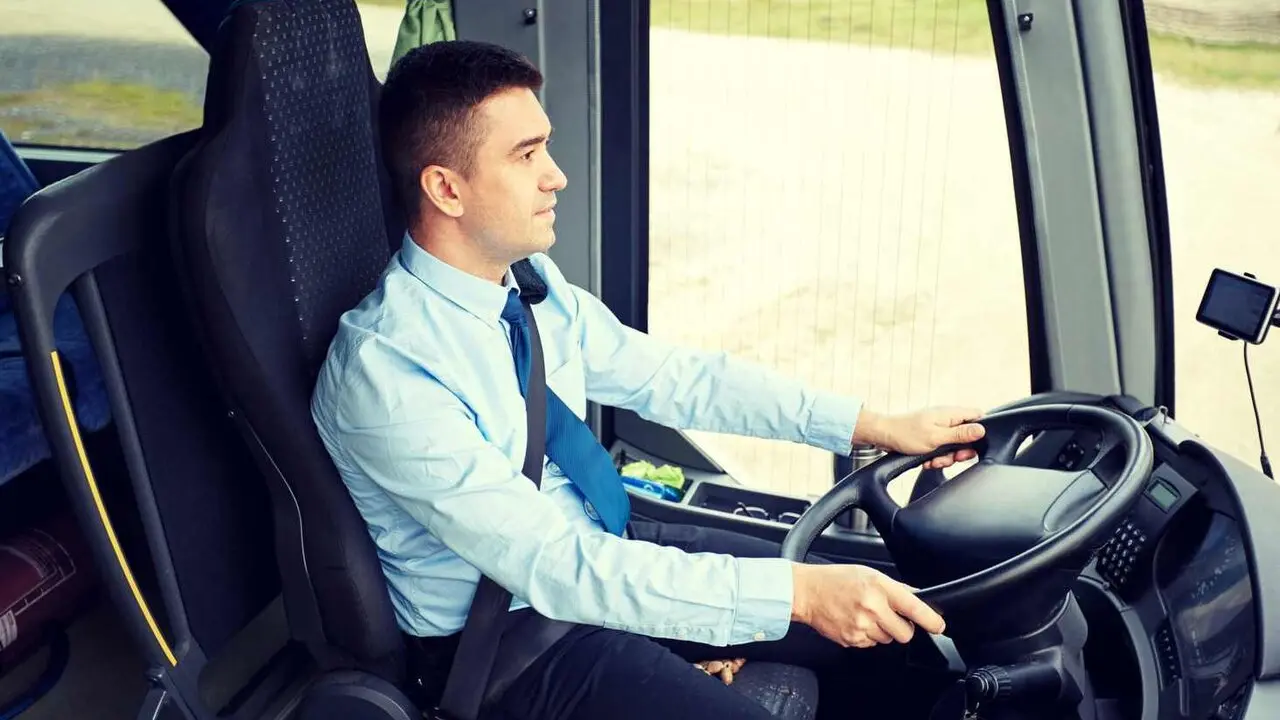 transport, tourism, road trip and people concept - happy driver driving intercity bus