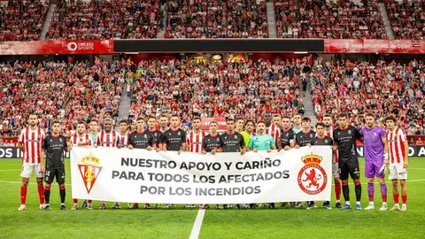 Pancarta inicial... solidaridad con los afectados por los incendios.