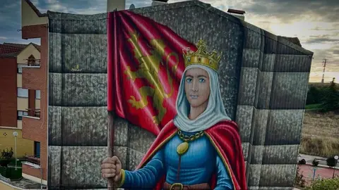 Sahagún rinde homenaje a la reina Urraca con un mural monumental como antesala del 900 aniversario de su muerte
Sahagún rinde homenaje a la reina Urraca con un mural monumental como antesala del 900 aniversario de su muerte. El artista leonés Manuel García Juan firma una obra de gran formato que representa a la primera reina de pleno derecho de España y Europa.