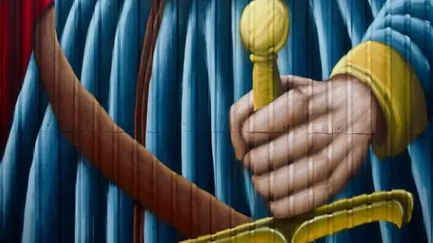 Sahagún rinde homenaje a la reina Urraca con un mural monumental como antesala del 900 aniversario de su muerte
Sahagún rinde homenaje a la reina Urraca con un mural monumental como antesala del 900 aniversario de su muerte. El artista leonés Manuel García Juan firma una obra de gran formato que representa a la primera reina de pleno derecho de España y Europa.