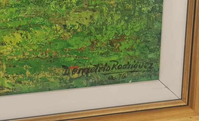 Firma de Demetrio Rodríguez en el cuadro.